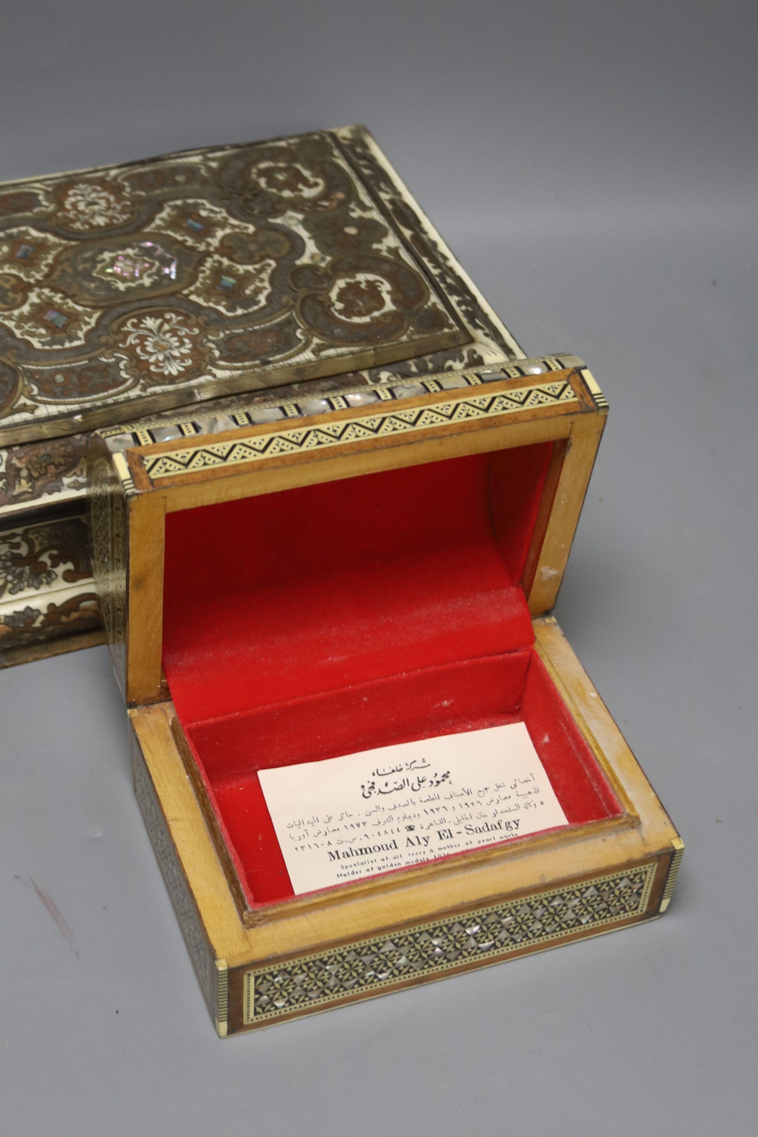 A 19th century French cut brass pewter and ivory inlaid jewellery box, h 10cm, 27 x 19cm, together with a parquetry box (2)